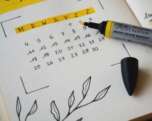 A calendar with a yellow highlighter