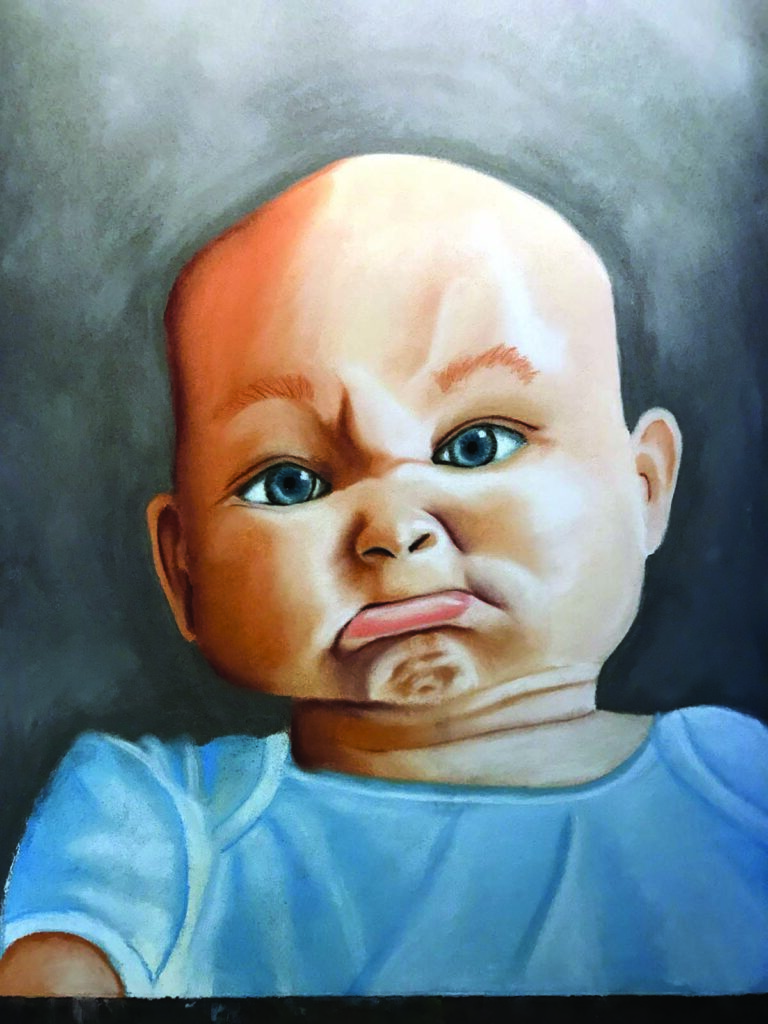 22”x30” pastel painting “Grumpy Boy,” by
Sandy Guinn, is one of many paintings in
the artist’s series of children making funny
faces. PHOTO BY SANDY GUINN